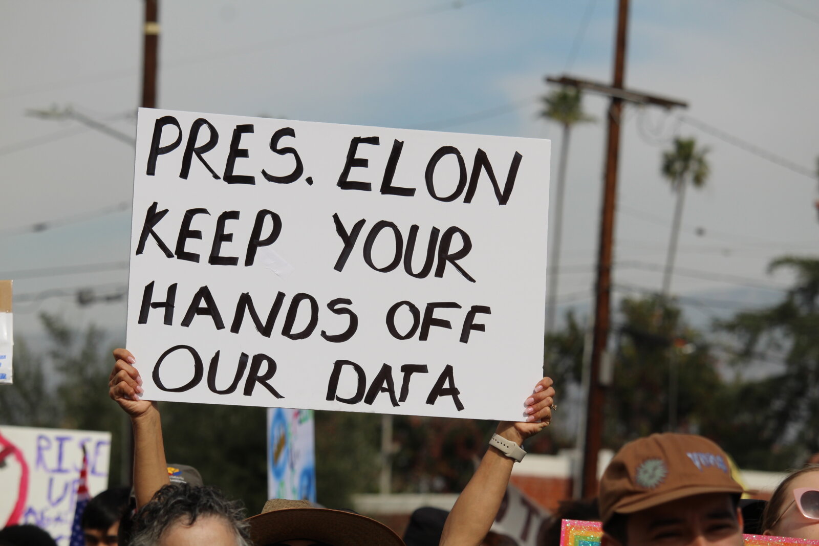 Photo of Presidents Day protestor on Feb. 17, 2025. Courtesy of Garrett Brooks.