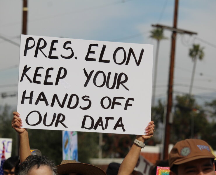 Photo of Presidents Day protestor on Feb. 17, 2025. Courtesy of Garrett Brooks.