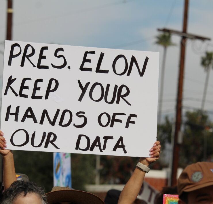 Photo of Presidents Day protestor on Feb. 17, 2025. Courtesy of Garrett Brooks.